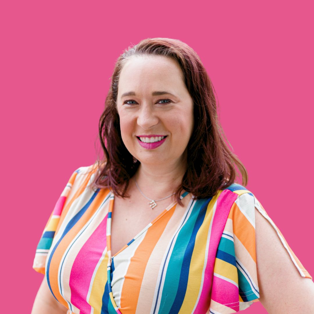 Mindy Marzec headshot with pink background